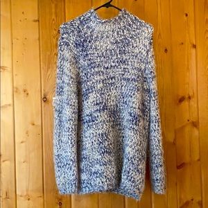 Oversized “shaggy” mock neck sweater